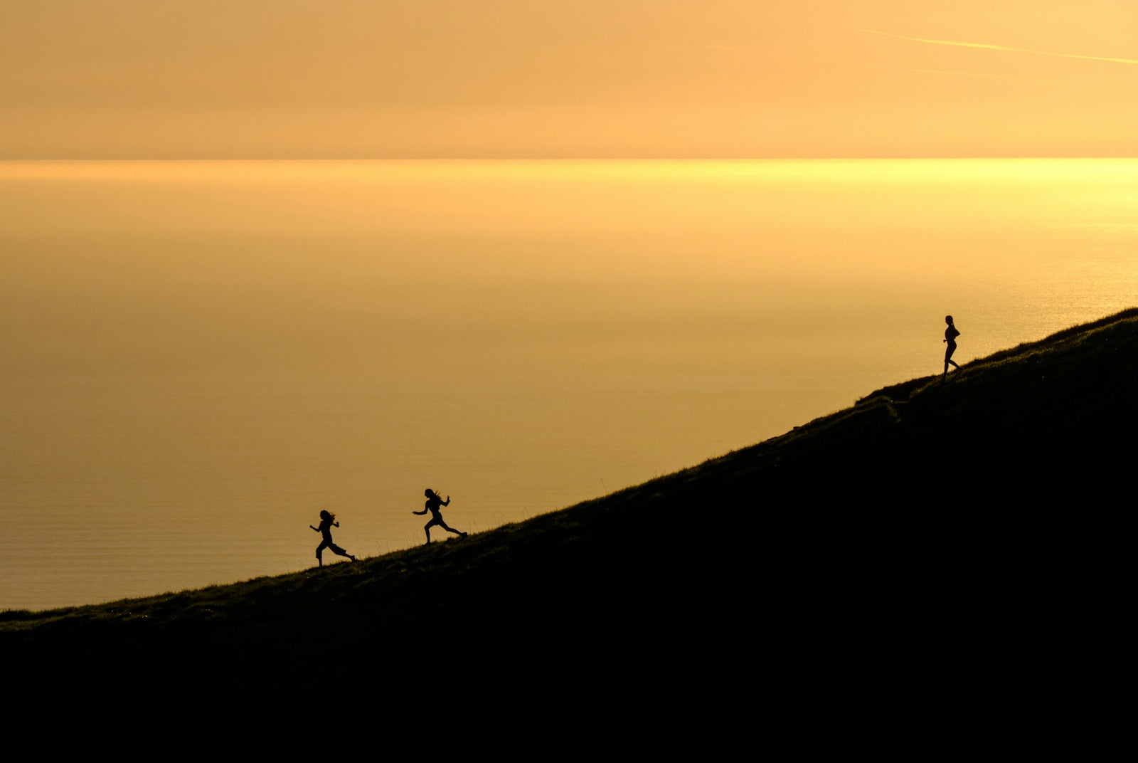 Runner on a ridge at dawn
